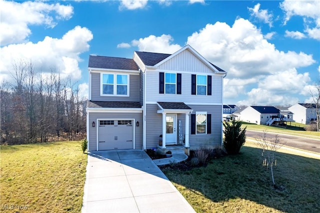 view of front facade with a front yard and a garage