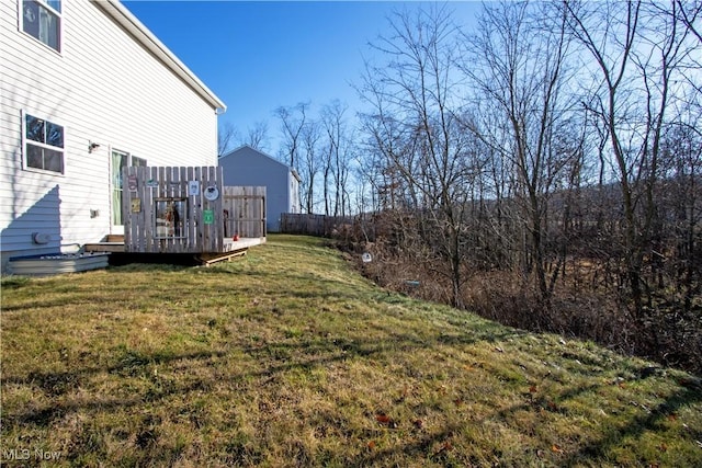 view of yard featuring a deck