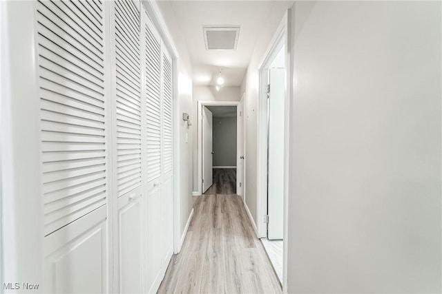 corridor featuring light wood-type flooring