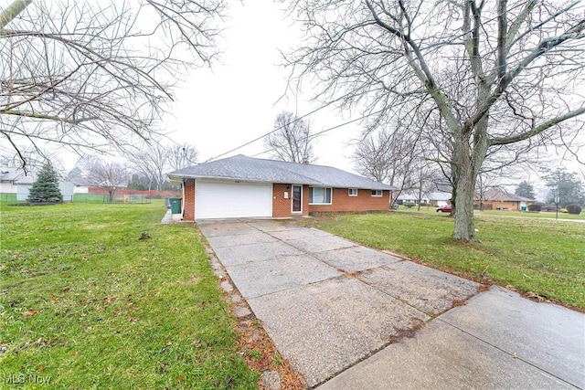 ranch-style house with a front lawn and a garage