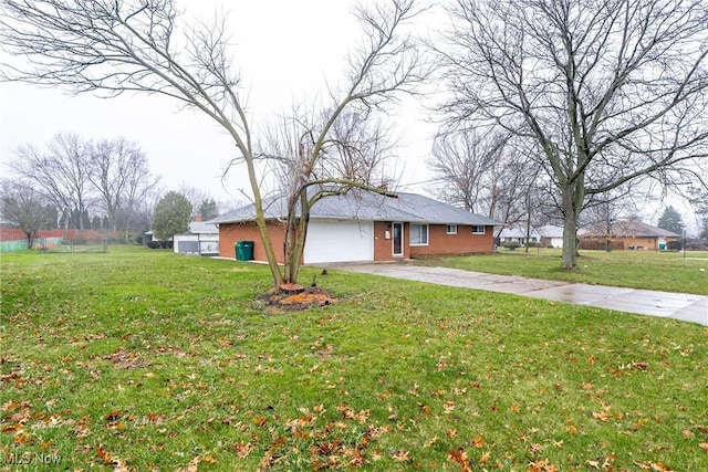 exterior space with a front lawn and a garage