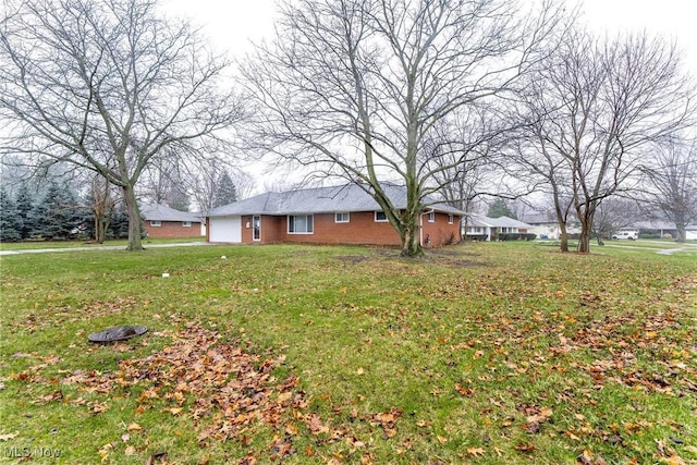 view of yard with a garage