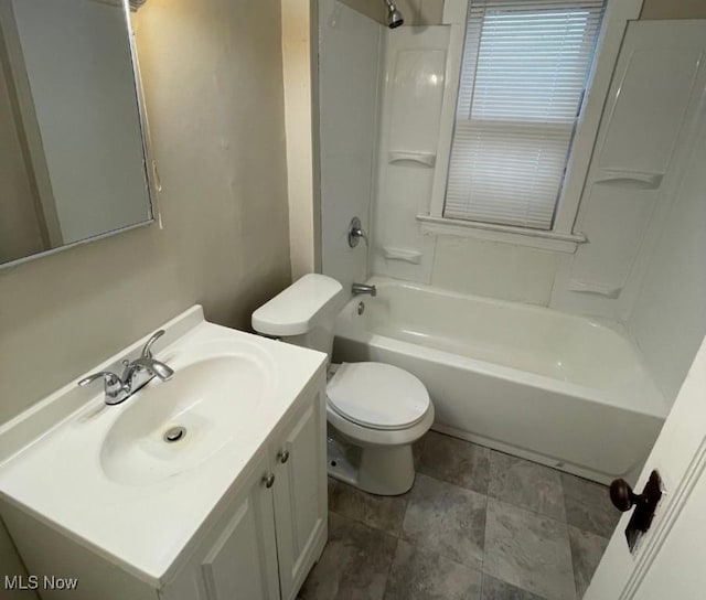 full bathroom featuring shower / washtub combination, vanity, and toilet