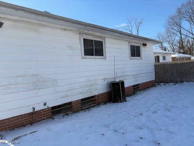 view of snow covered property