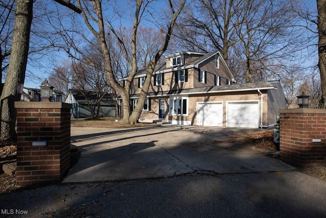 view of front of home with a garage