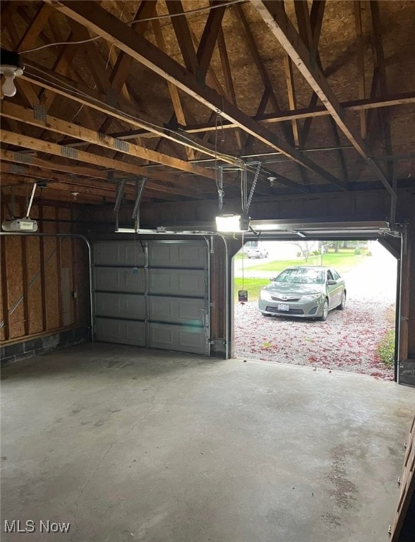 garage featuring a garage door opener