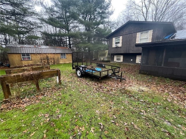 view of yard featuring a sunroom