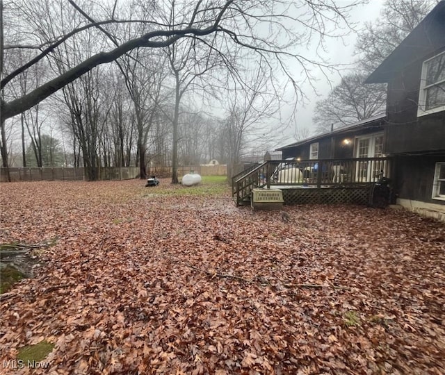 view of yard with a deck