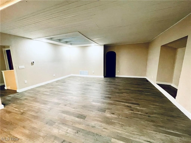 unfurnished room with hardwood / wood-style floors