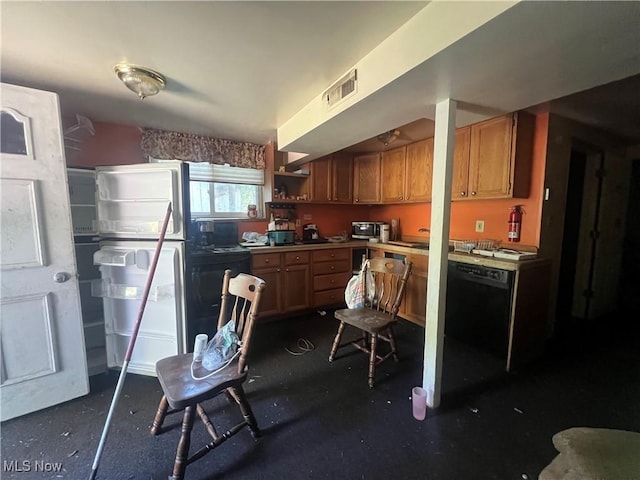 kitchen featuring black dishwasher