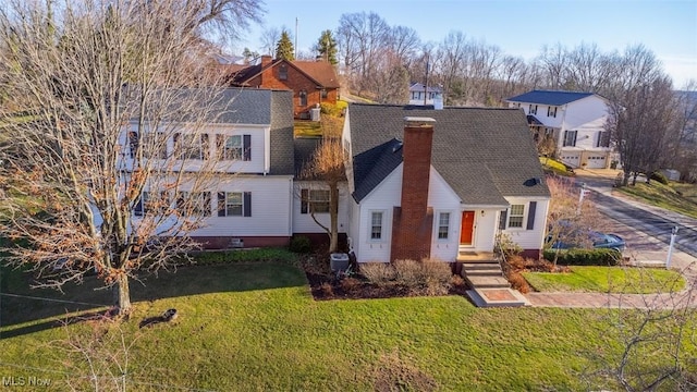 view of front of house with a front lawn