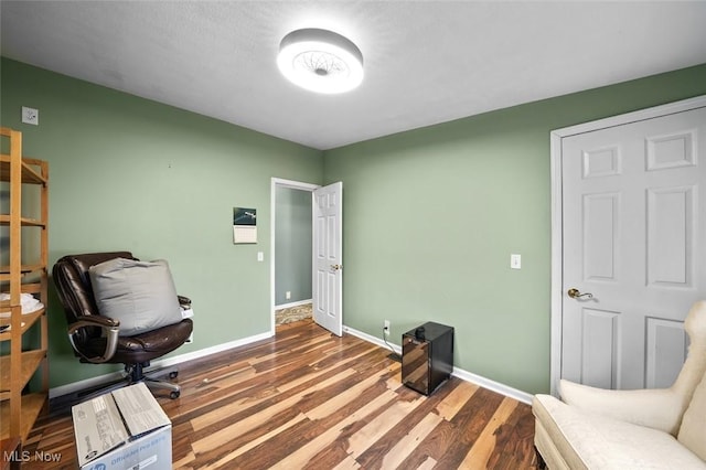 office area with dark hardwood / wood-style floors