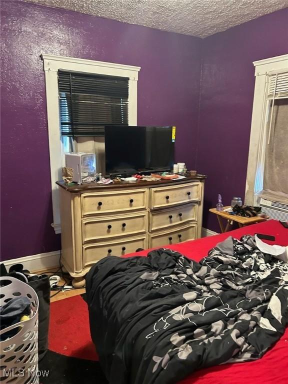 bedroom with a textured ceiling