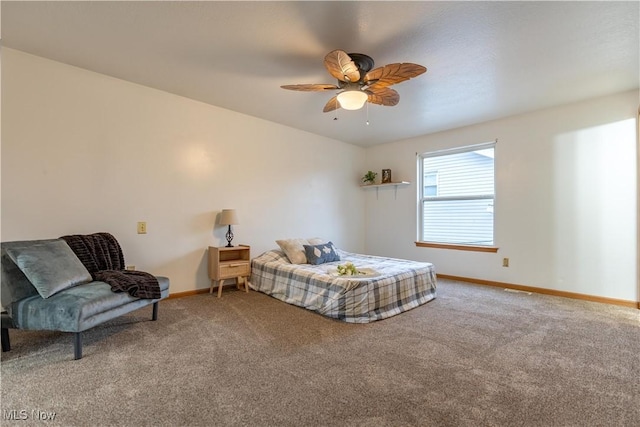 bedroom with ceiling fan and carpet