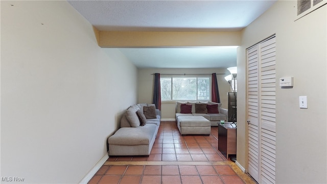 living room with tile patterned flooring