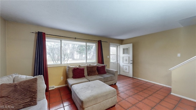 living room with tile patterned flooring