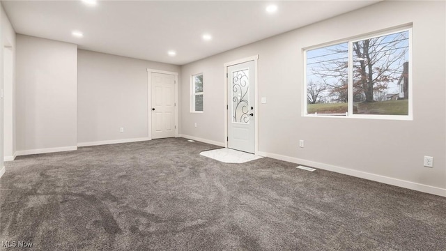 interior space with dark carpet