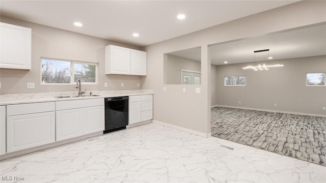 kitchen featuring dishwasher, white cabinets, sink, light stone countertops, and decorative light fixtures