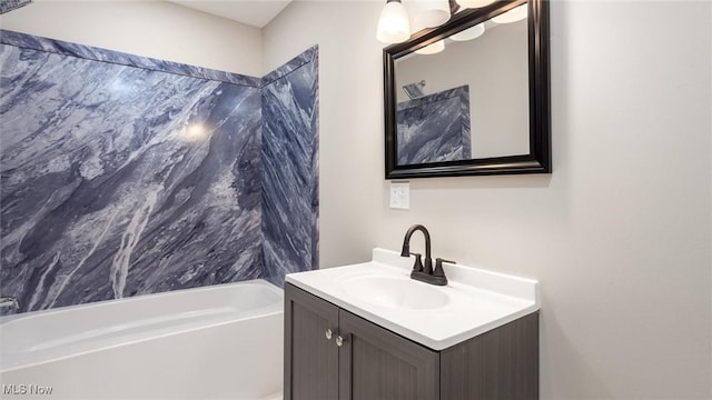 bathroom with vanity and tub / shower combination