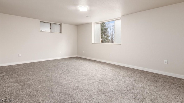 unfurnished room featuring carpet floors