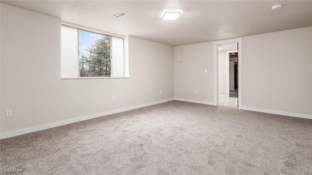 unfurnished room featuring carpet