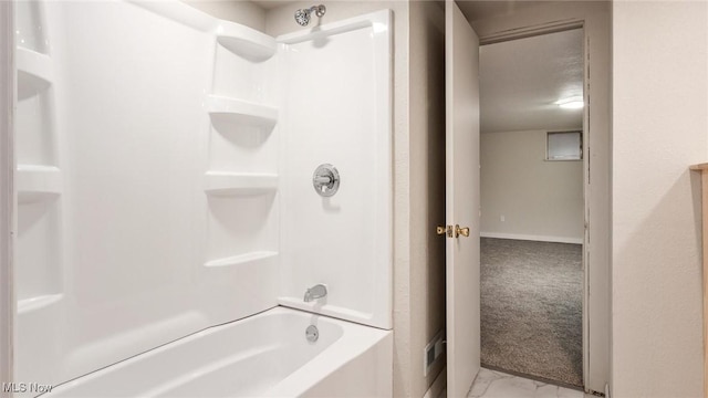 bathroom with shower / bathtub combination