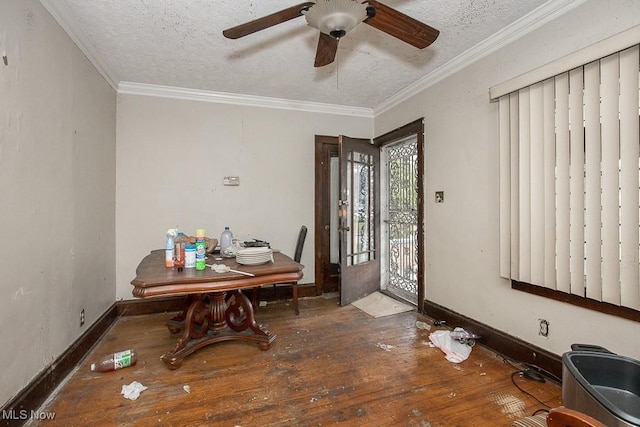 dining room with crown molding, ceiling fan, a textured ceiling, and hardwood / wood-style flooring