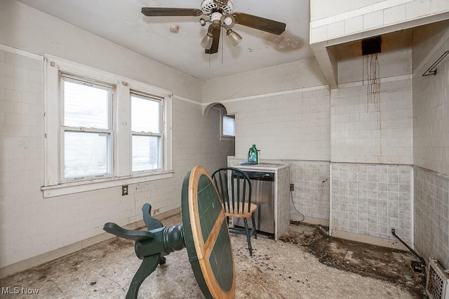 interior space featuring ceiling fan