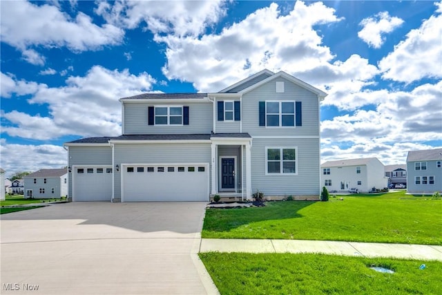 front facade featuring a front yard and a garage