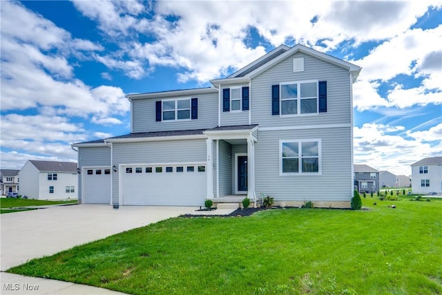 front of property featuring a garage and a front yard