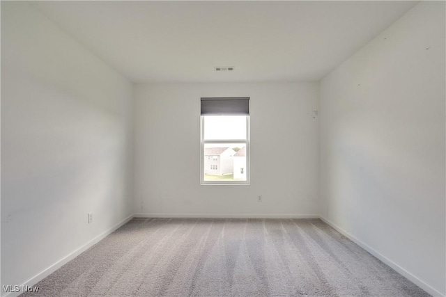 spare room with carpet flooring