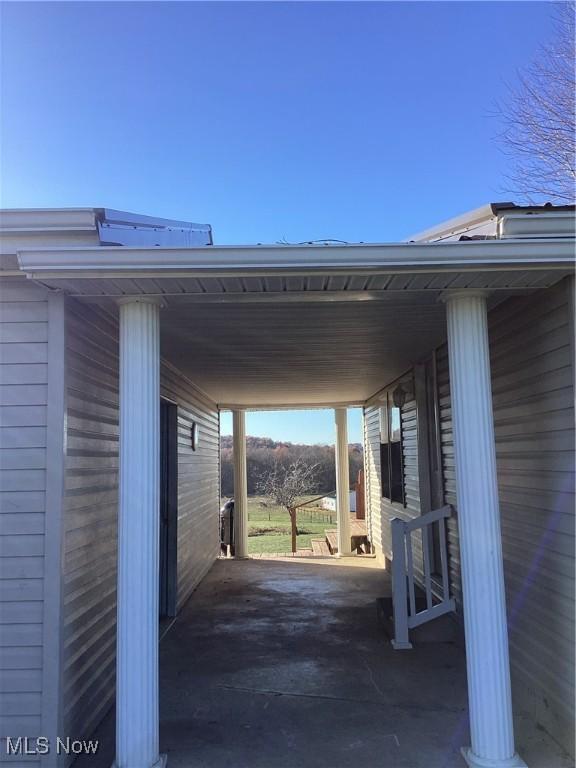 view of patio with a carport