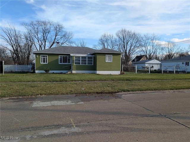 view of front of home with a front yard