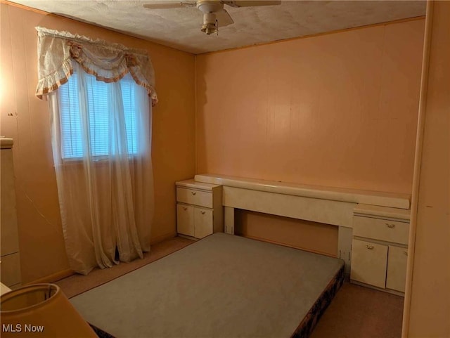 unfurnished bedroom with ceiling fan