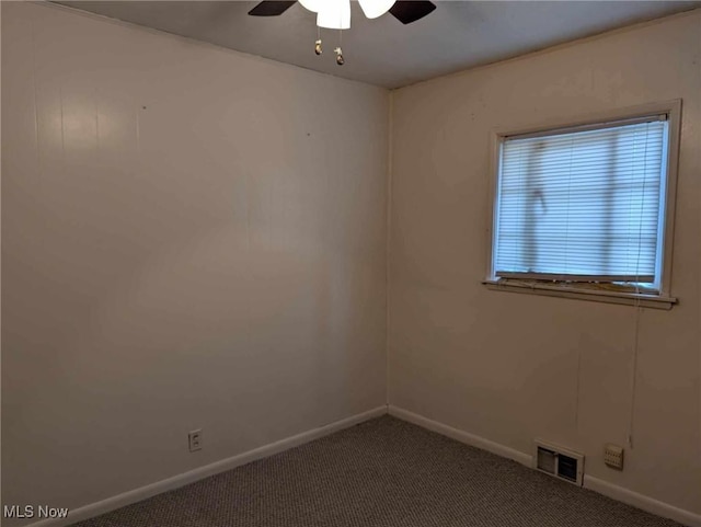 carpeted empty room with ceiling fan