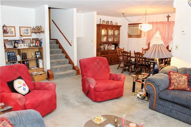 living room with carpet floors and a wall unit AC