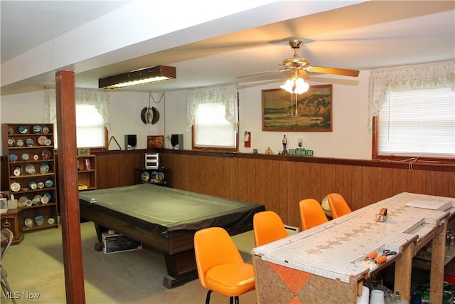 recreation room with wood walls, plenty of natural light, carpet floors, and billiards