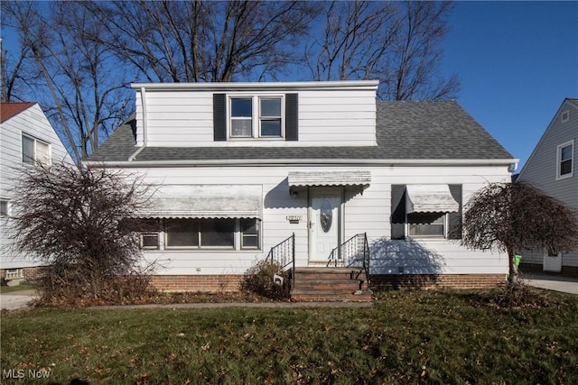 front of property with a front yard