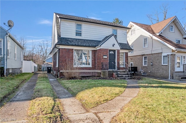 view of front facade with a front lawn