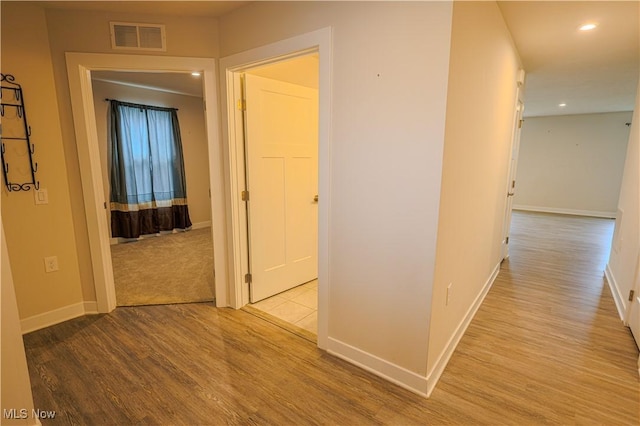 hallway featuring light wood-type flooring