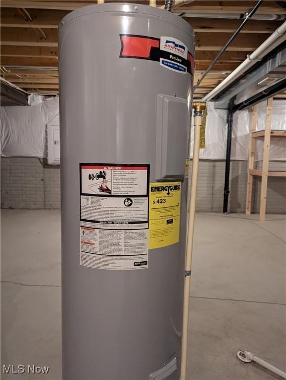 utility room featuring water heater