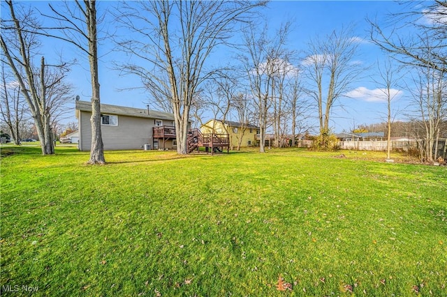 view of yard featuring a deck