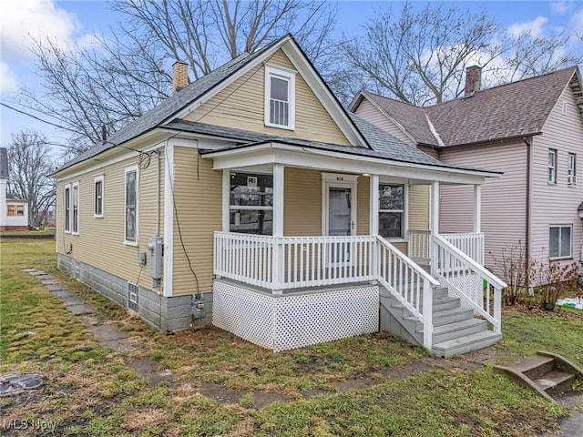 view of front of home featuring covered porch