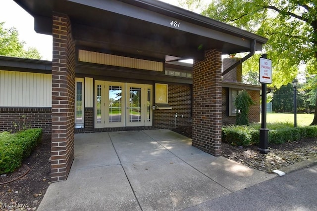 entrance to property featuring french doors