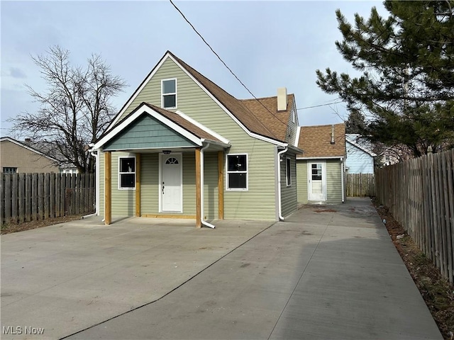 bungalow-style home featuring a patio area