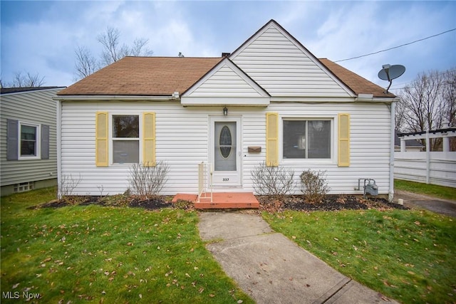 bungalow with a front yard