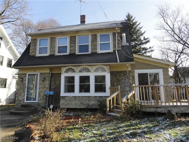 view of front of home with a wooden deck