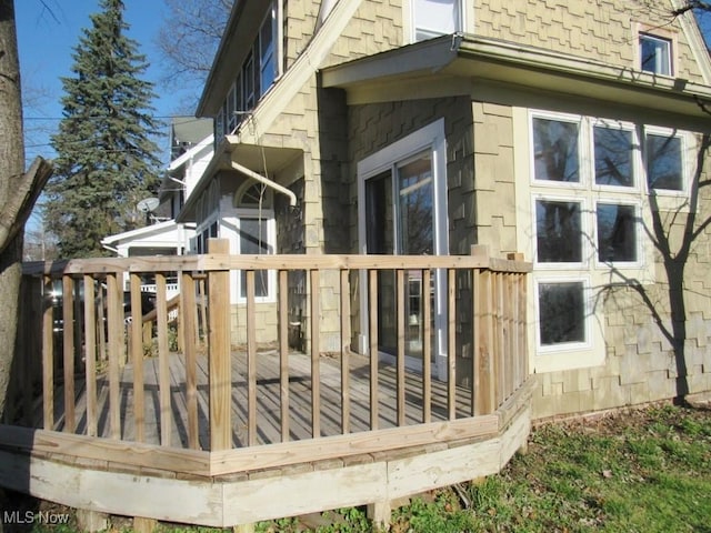 view of property exterior featuring a deck