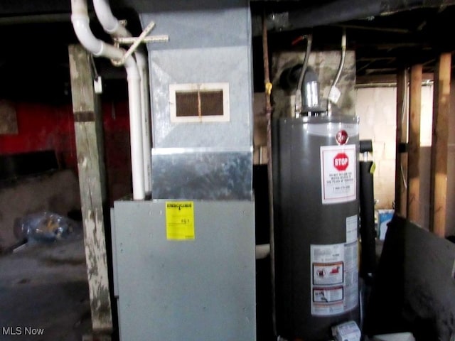 utility room with water heater