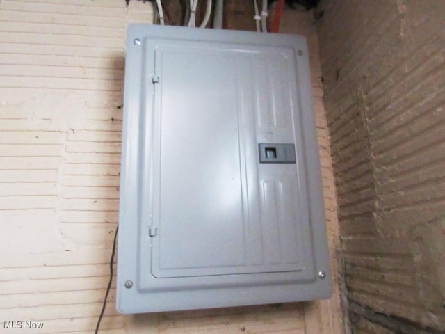 utility room featuring electric panel